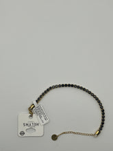 Bracciale tennis con catena dorata e nera