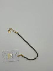 Bracciale tennis con catena dorata e nera