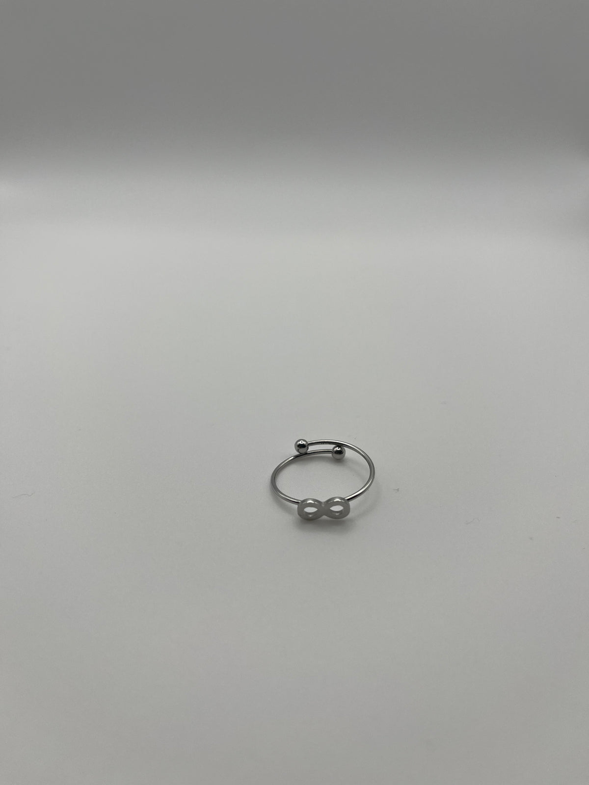 Anello regolabile infinito argento