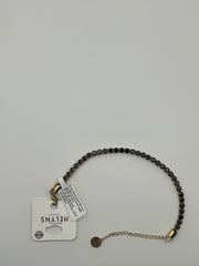 Bracciale tennis con catena dorata e nera