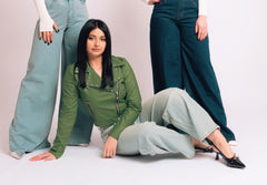 Chiodo in similpelle con borchie